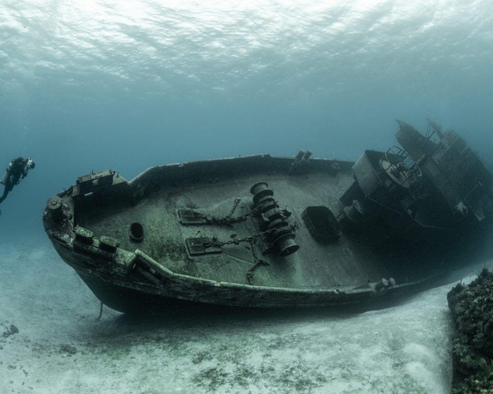 divers-examining-famous-uss-kittiwake-submarine-wreck-grand-cayman-islands